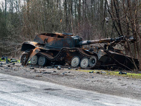 War in Ukraine. Armored vehicles of the Russian army on the streets of Ukraine. Military tanks and...