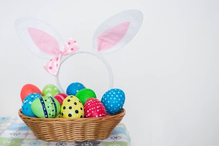 Happy Ester. View of multicolored Easter eggs with handmade ornament.