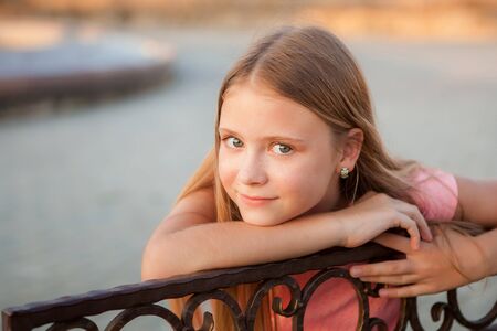 Sweet little girl outdoors.
