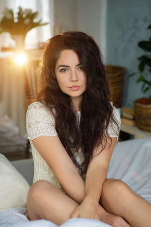 Closeup portrait of a beautiful young woman looking at camera.