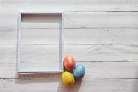 Happy easter background. Frame for text with easter eggs. Easter card with copy space for text.の写真素材
