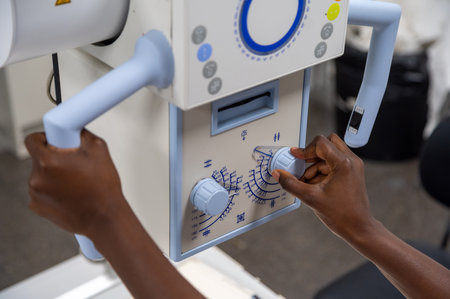 A radiologist using an xray machineの写真素材