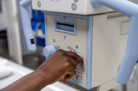 A radiologist using an xray machineの写真素材