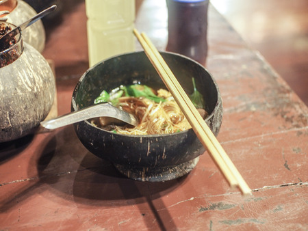 Noodles in a coconut shellの写真素材