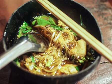 Noodles in a coconut shellの写真素材