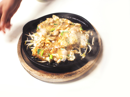 Oyster omelette  on the white backgroundの写真素材