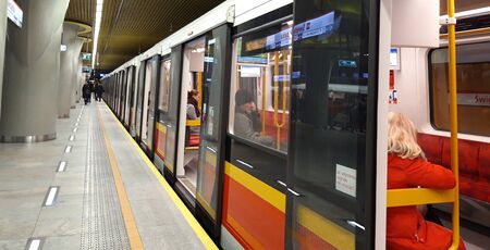 Warsaw, Poland, Jan 14, 2020: Train with open doors on the underground metro station