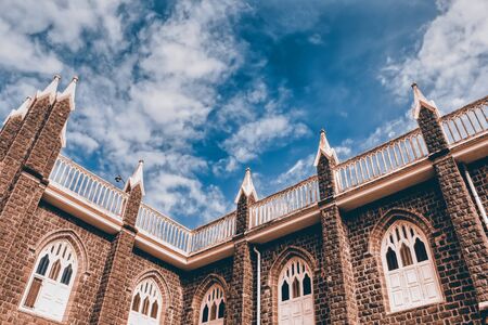 High rise low angle photo of Arthunkal St. Andrew's Basilica situated in Kerala, India.の写真素材