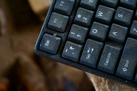 Old computer keyboard with dust and dirt
