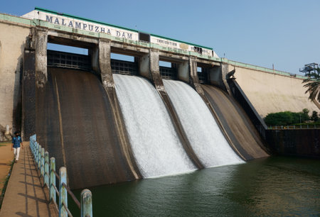 MALAMPUZHA, KERALA, INDIA - DECEMBER 08, 2021: Side view of Malampuzha Dam located in Palakkad from the starting point of the bridge.のeditorial素材