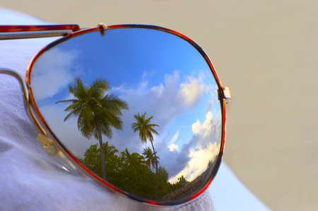 Nice beach which is reflected in glassesの写真素材