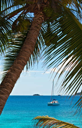 Seascape view with a nice  yacht, Seychelles, La Digue islandの写真素材