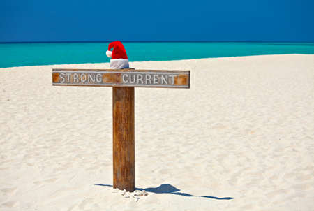 Santa  Claus has been carried away of a strong current  safety first の写真素材