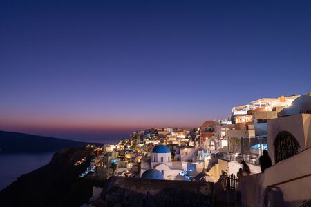 A beautiful shot of the village of Oia, on the island of Santorini, Greece, after the sunset and...