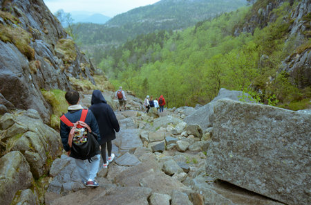 Rogaland, Norway - 23rd May, 2017: Visitors heading down the treacherous trail after having visited the Pulpit rock, Norway. Also called Preikestolen or Preacher's pulpit.のeditorial素材