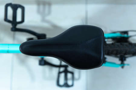 Top view selective focus of a black textured bicycle seat.の写真素材