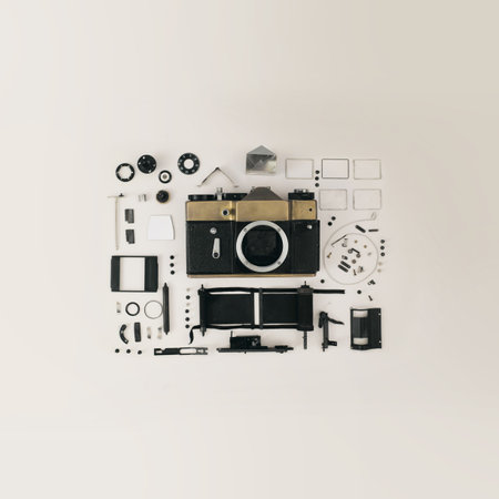 Flat lay top view of old camera and photographic equipment on white backgroundの写真素材