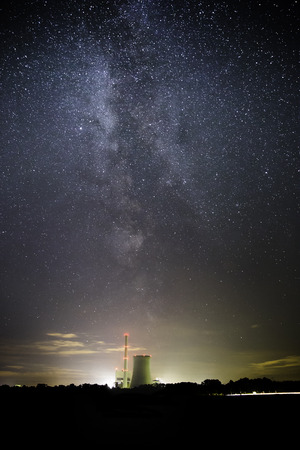 The picture shows a power plant and the Milky Way.のeditorial素材