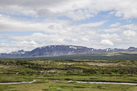 The picture shows a rough landscape in Thingvellir National Park in Iceland.の写真素材