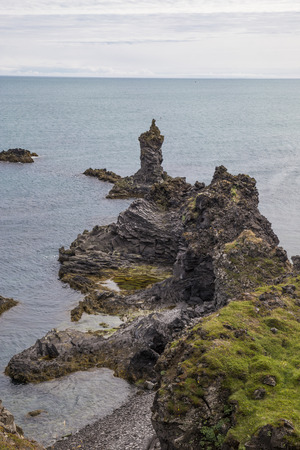 The picture shows the rocky coast near Arnarstapi, Iceland.の写真素材