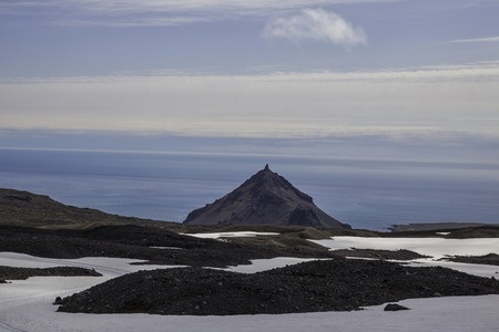 The picture shows the view from Snaefellsjkull, there are so traces of a snowcat in the snow to see.