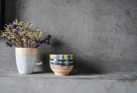 flowerpots with concrete wall backgroundの写真素材