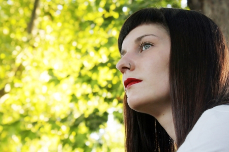 Portrait of a young woman in nature