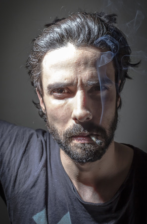 Portrait of a man smokingの写真素材
