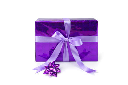 Gift box with bow and ribbon on white background