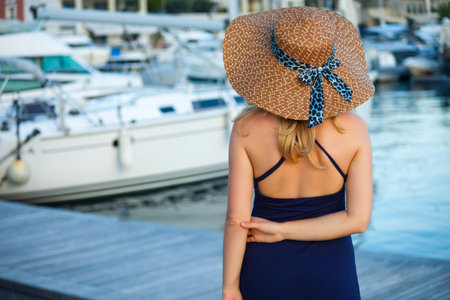 Attractive woman on yachts backgroundの写真素材