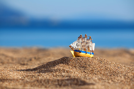 Souvenir sailing vessel on a beachの写真素材