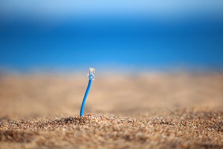 Internet cables on a beach