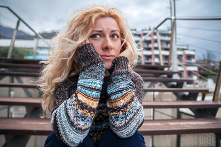 Sad woman on a streetの写真素材