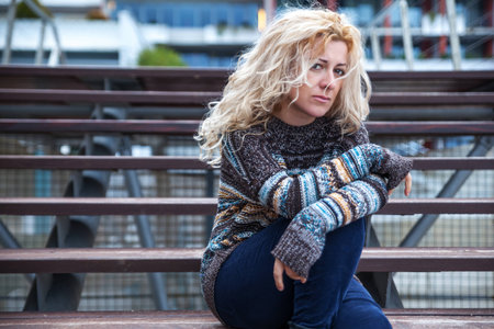 Sad woman on a street