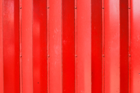 red dirty store mechanical shutter door, industrial backgroundの写真素材