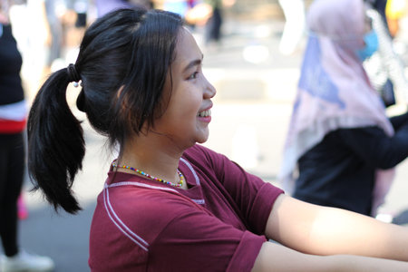 happy asian young woman dancing at summer festival, cheerful asian woman having fun at music...
