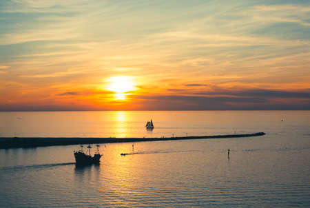 Beautiful Florida sunset. Ships and boats on the Gulf of Mexico at sunset. Ariel view of Sand Key...
