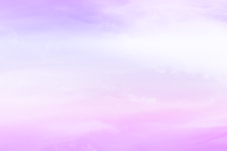Purple violet pastel sky with white clouds. Cloudscape background. Fresh multi colours sky.