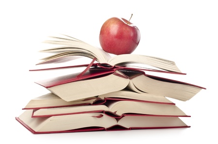 Stack of books with apple; back to school or university or college; learning; educationの写真素材