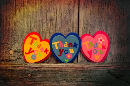 Decorative hearts on wooden backgroundの写真素材