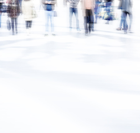 abstract photo of people in motion, multiple exposure effect.Blurred people walking through a city...
