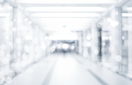abstract defocused blurred background, empty business corridor or shopping mall. Medical and hospital corridor defocused background with modern laboratory clinicの写真素材