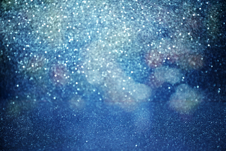 Blue glittering christmas lights. Blurred abstract backgroundの写真素材