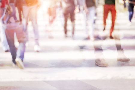 pedestrian on zebra in motion blurの写真素材