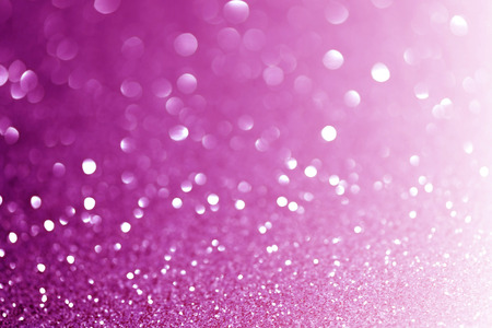 purple glittering christmas lights. Blurred abstract background