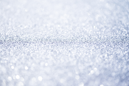 Silver glittering christmas lights. Blurred abstract backgroundの写真素材