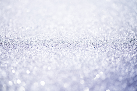 Silver glittering christmas lights. Blurred abstract backgroundの写真素材