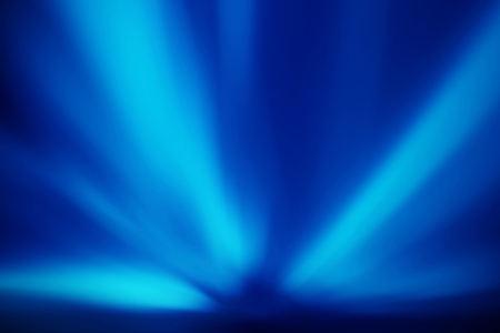 blue abstract background of light raysの写真素材
