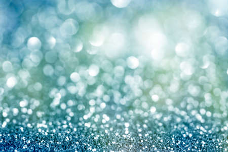 blue defocused glitter background with copy spaceの写真素材