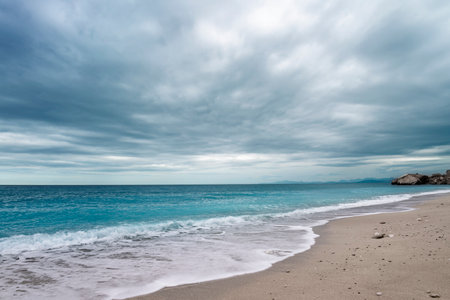 Tropical  sand beach and blue sky, sea before the stormの写真素材
